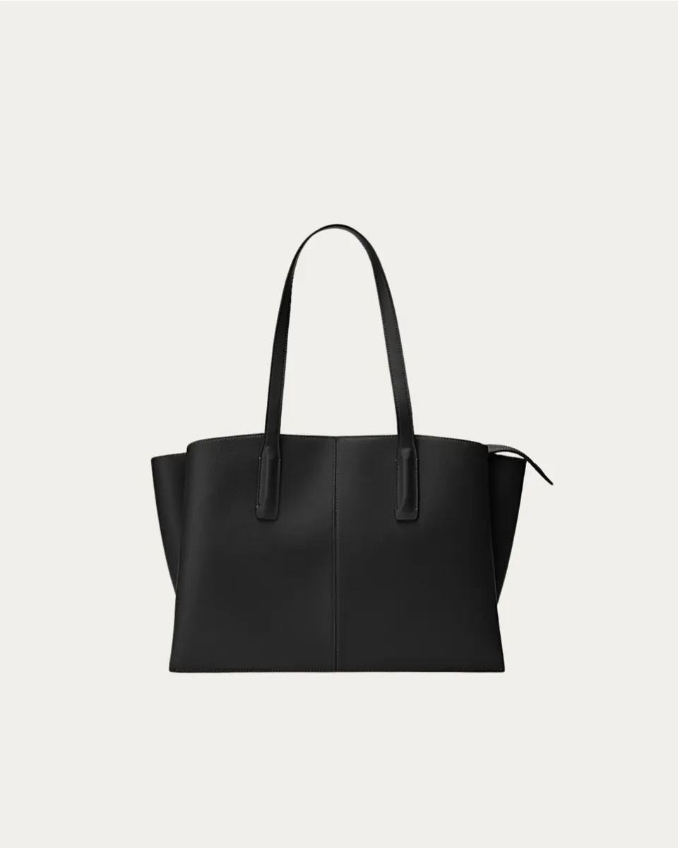 Styling a black leather tote isolated