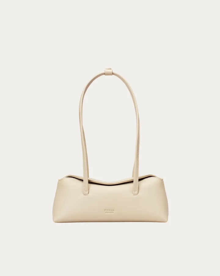 Styling a cream leather shoulder bag